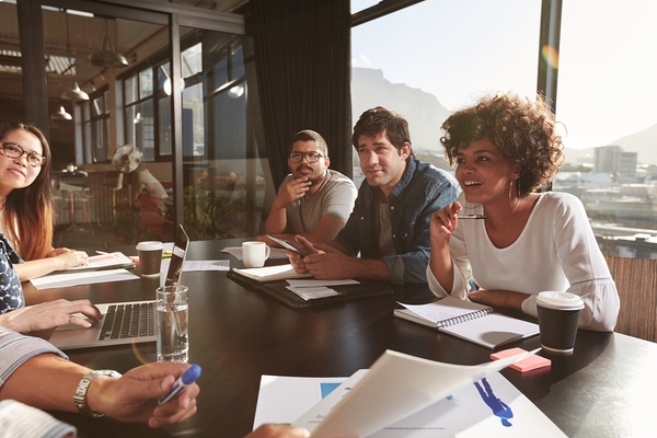 Group of employees discussing ideas.